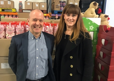 Kelly visiting Hancock's Cash and Carry
